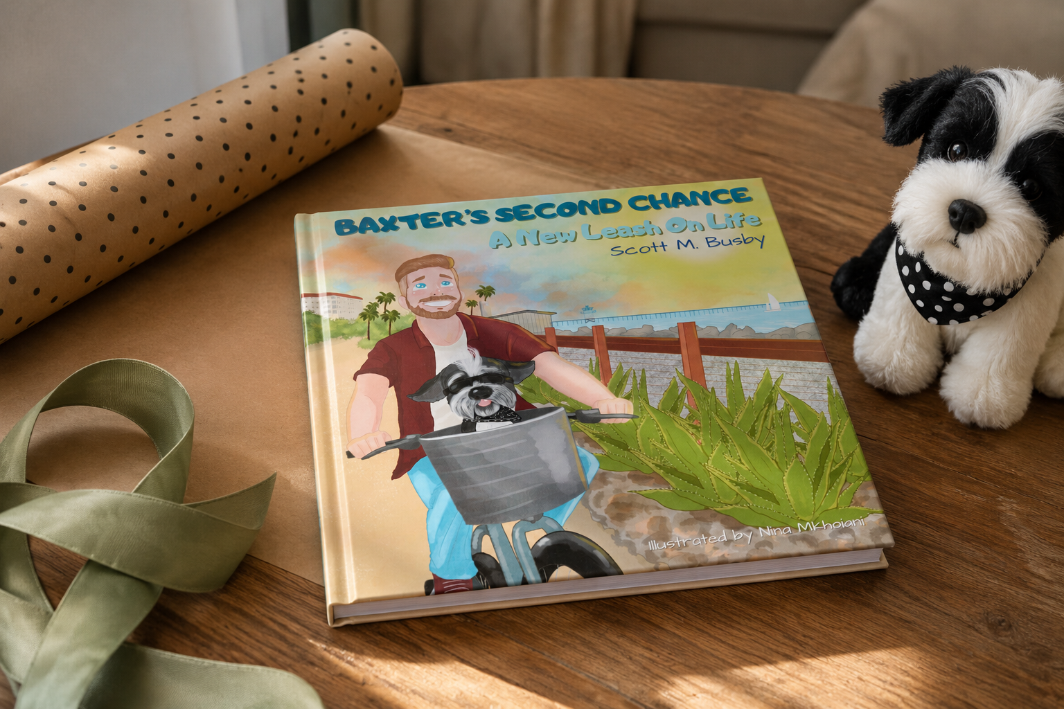 Baxter's Second Chance hardcover with wrapping paper, ribbon, and a small plush dog